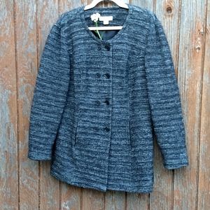 Modest tweed jacket.